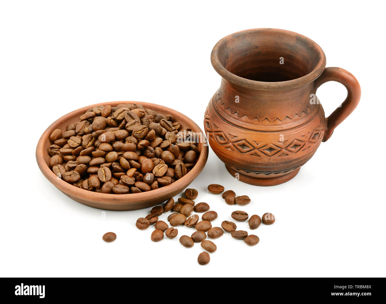 ceramic cup of coffee beans isolated on white background Stock Photo