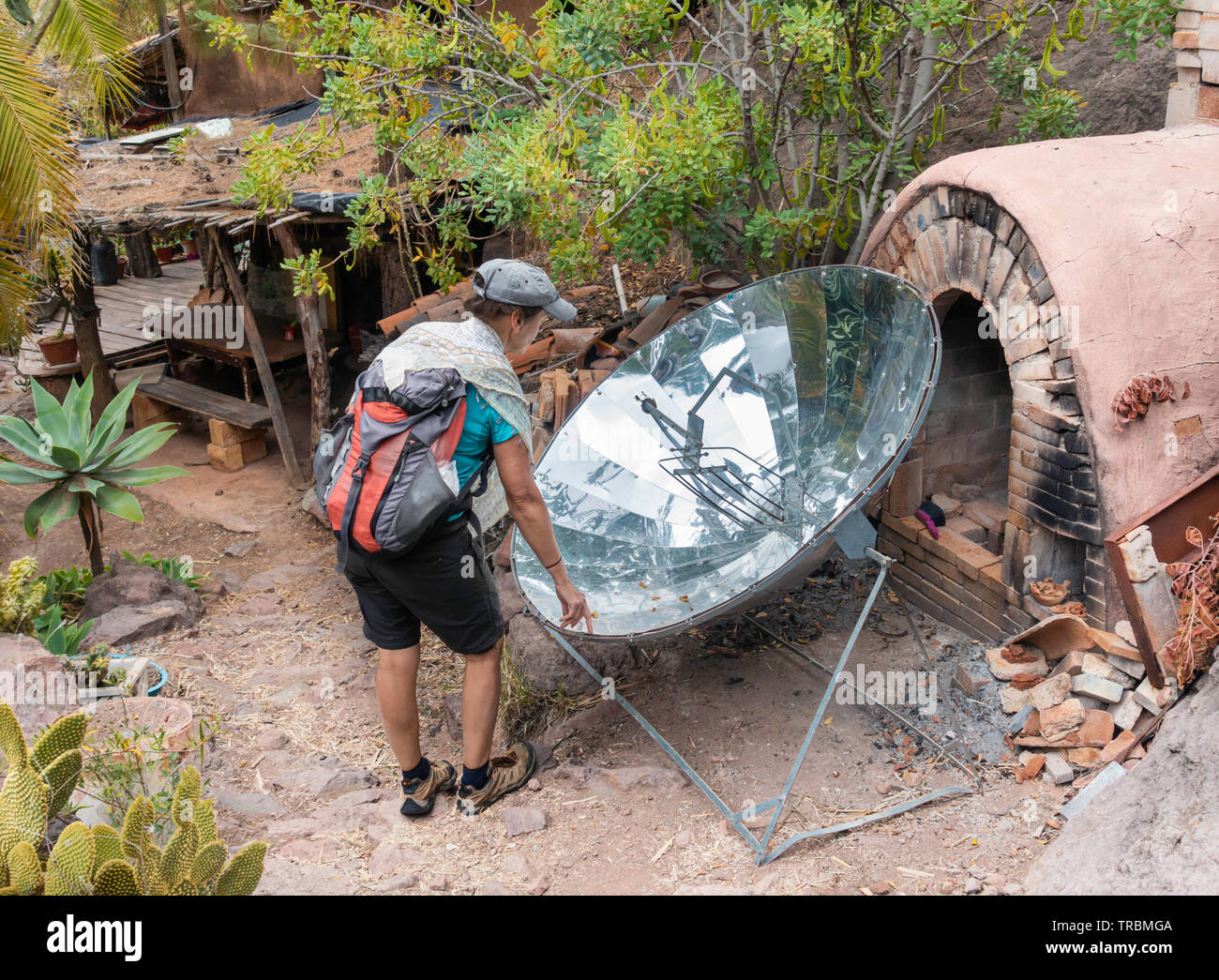 Parabolic solar cooker in hippy commune in Spain Stock Photo