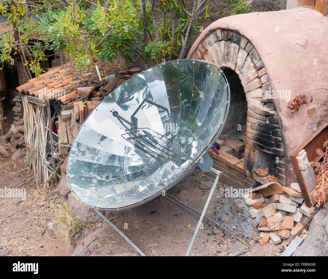 Parabolic solar cooker in hippy commune in Spain Stock Photo