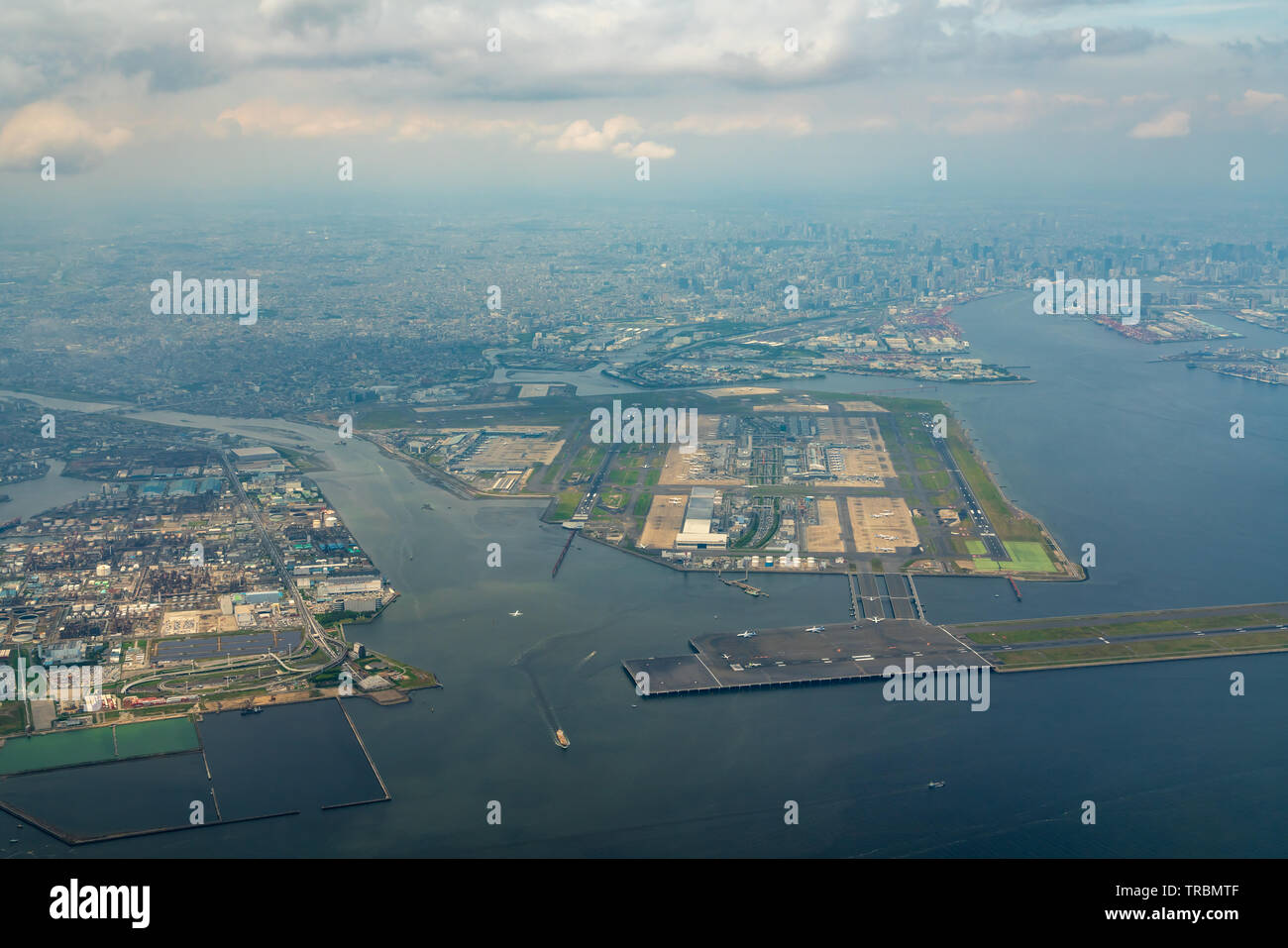 Aerial view of Tokyo Bay around the Haneda International Airport in Tokyo, Japan. Stock Photo