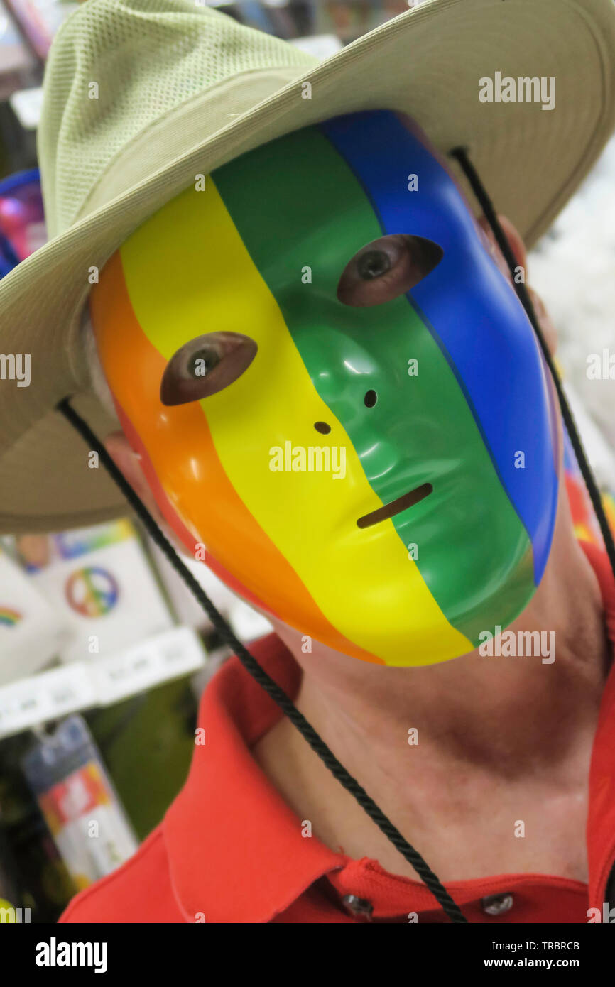 Man in a World pride Rainbow Mask, USA Stock Photo