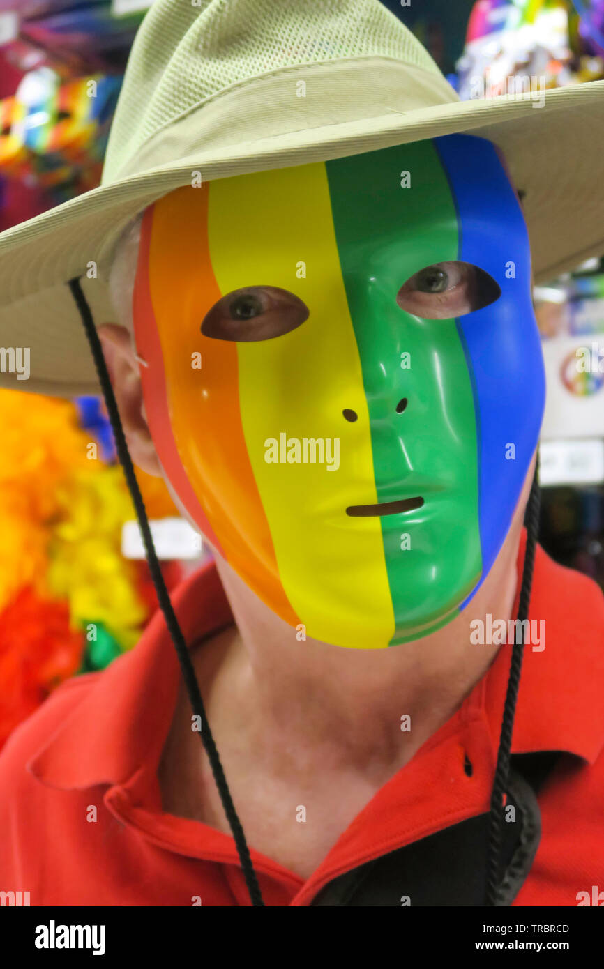 Man in a World pride Rainbow Mask, USA Stock Photo