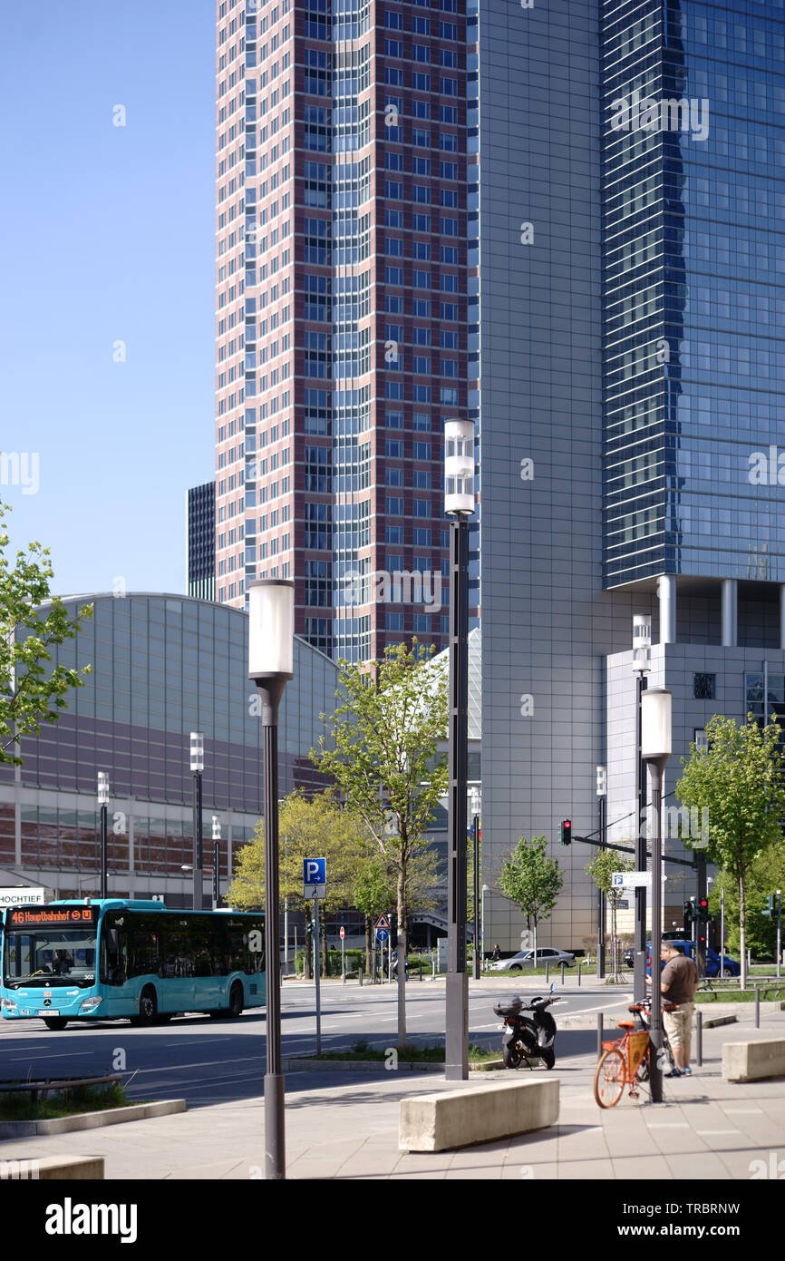 Frankfurt, Germany - April 18, 2019: Bus traffic and infrastructure in front of the Festhalle Messe Frankfurt and the Kastor skyscraper on April 18, 2 Stock Photo