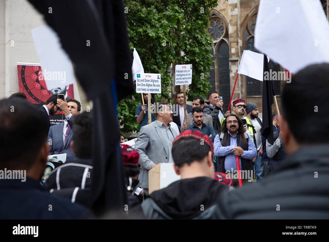 London, UK. 30th May 2019. Pashtuns protest opposite the House of Parliament in London against alleged persecution and atrocities by fundamentalist groups, the Pakistani army and Pakistani Intelligence Service committing brutal killings, the demolishing of properties, disappearances and extra-judicial killings of Pashtuns and members of other tribes in Pakistan. Credit: Joe Kuis / Alamy Stock Photo