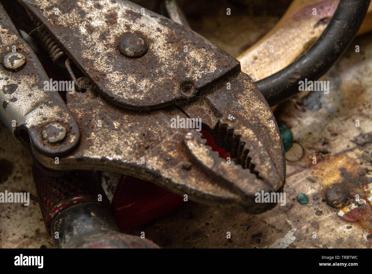 A rusty adjustable hand grip pliers Stock Photo