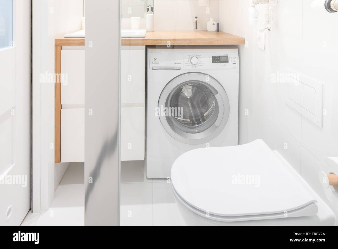 Modern bathroom equipment, details. Wise elegant solutions. White key. Stock Photo