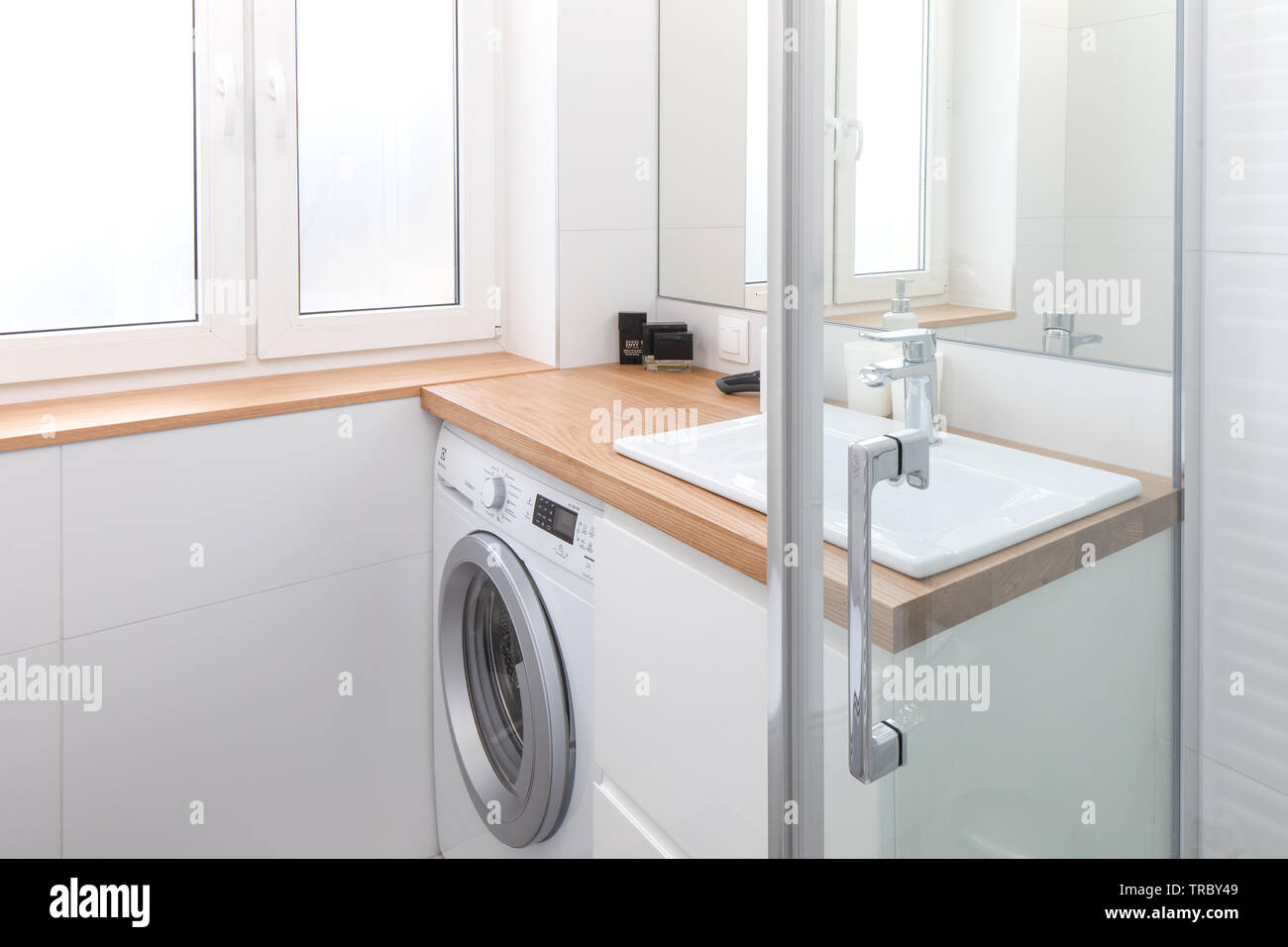 Modern bathroom equipment, details. Wise elegant solutions. White key. Stock Photo