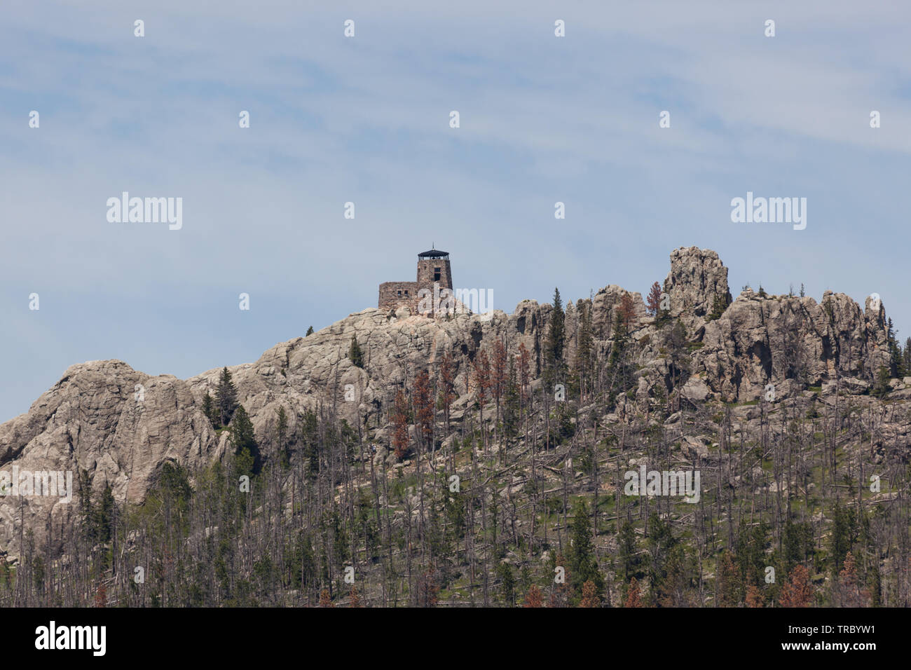 Black Elk Peak ( formerly Harney Peak) and tower which overlooks eroded rock formations and a