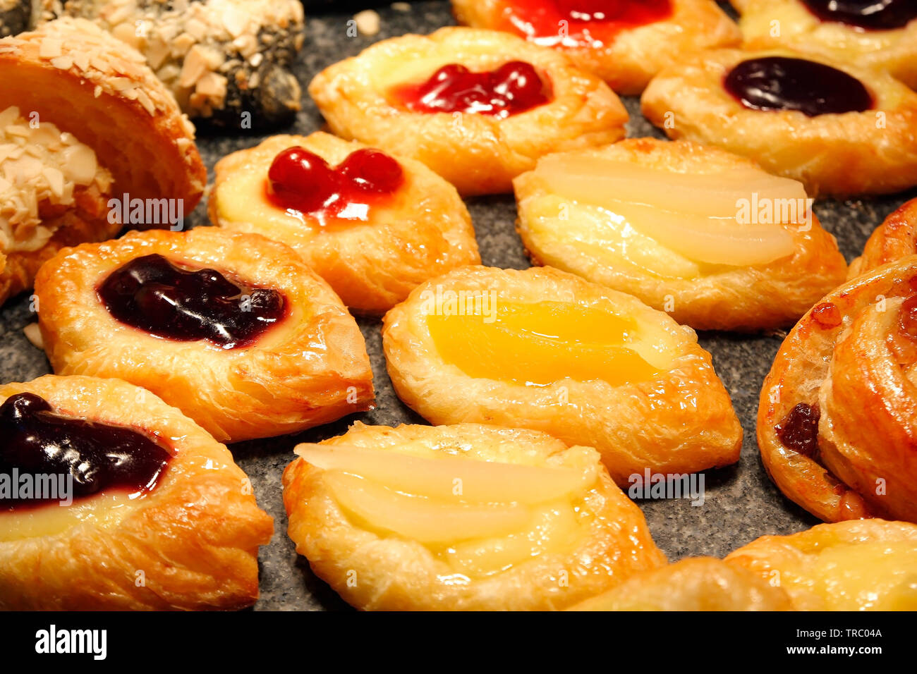 pile of fruit danish dessert on buffet line Stock Photo - Alamy