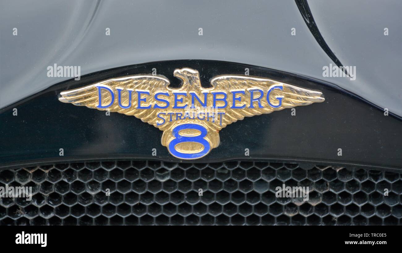 Duesenberg logo on hood of collector car at parade which is in perfect condition from the 1930's Stock Photo