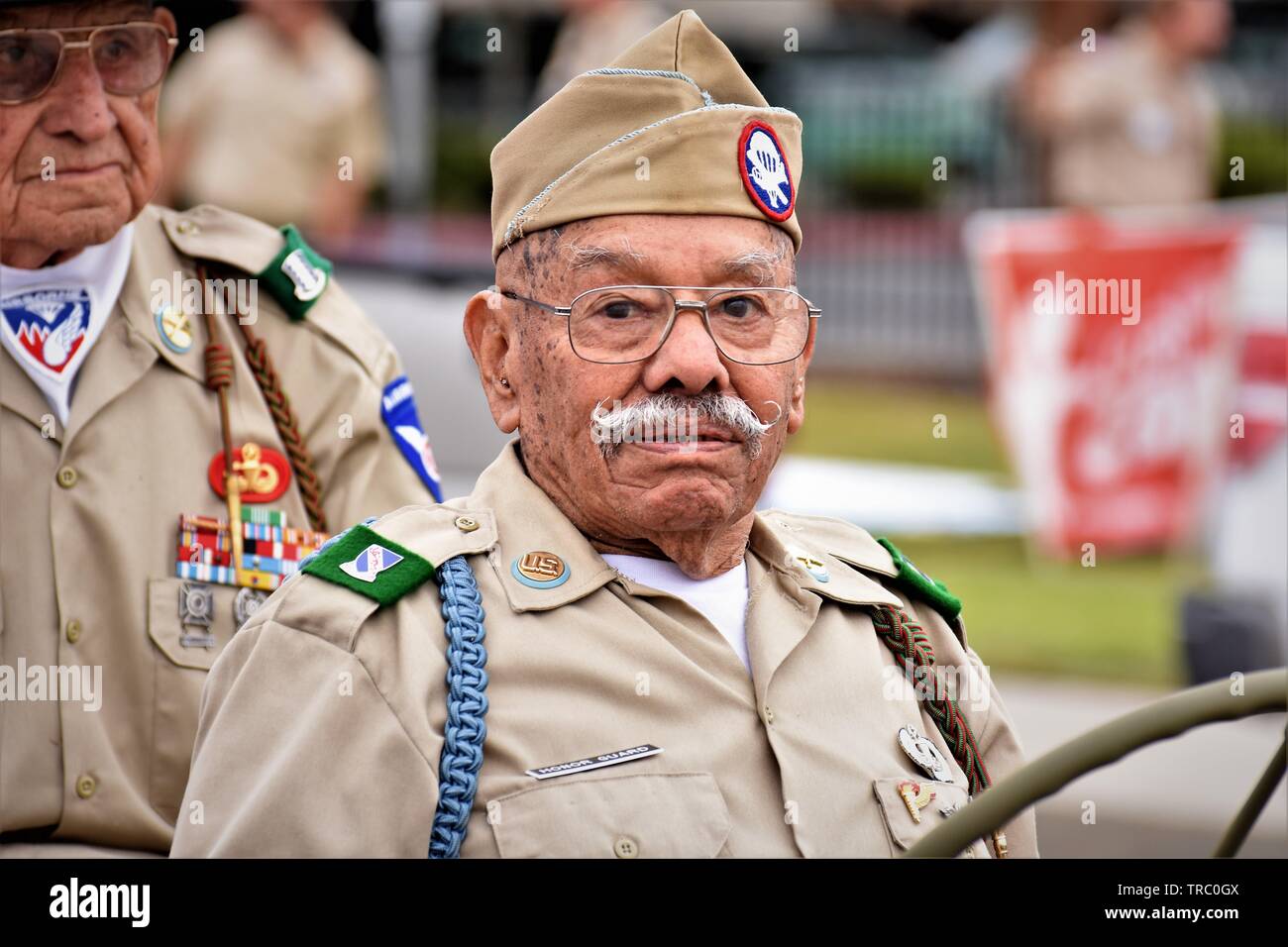 Old senior men veterans of world war 2 II who were dropped into France in Gliders made in Wichita, now in California USA America 90s Mexican Latinos Stock Photo