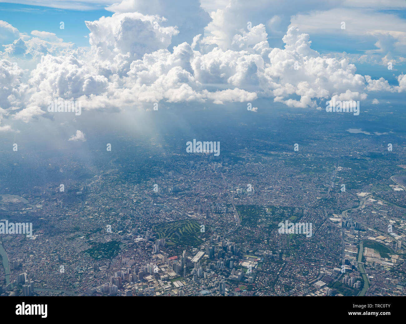 Aerial photo of Manila, the Philippines, with sun rays shining through