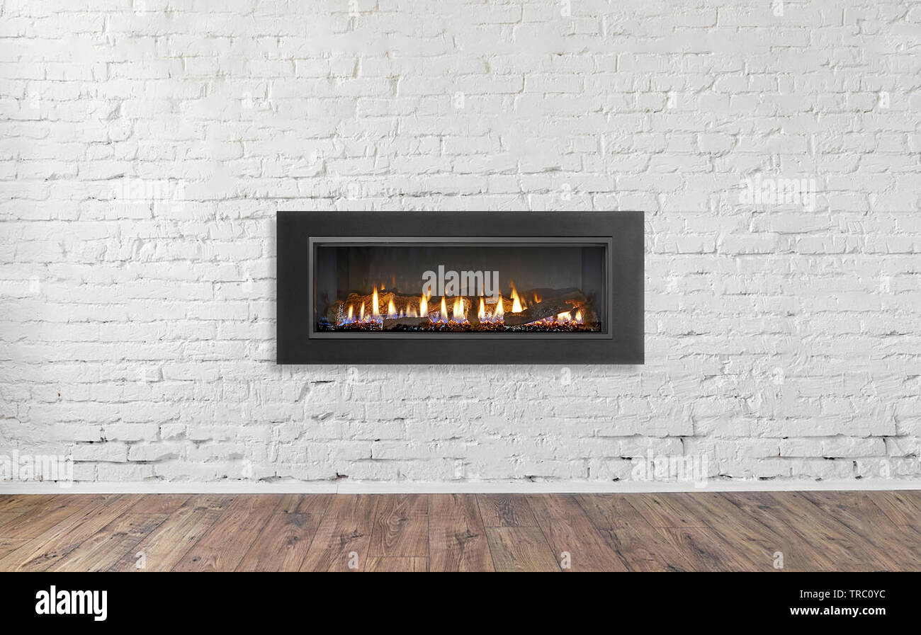 Gas Fireplace On White Brick Wall In Bright Empty Living Room