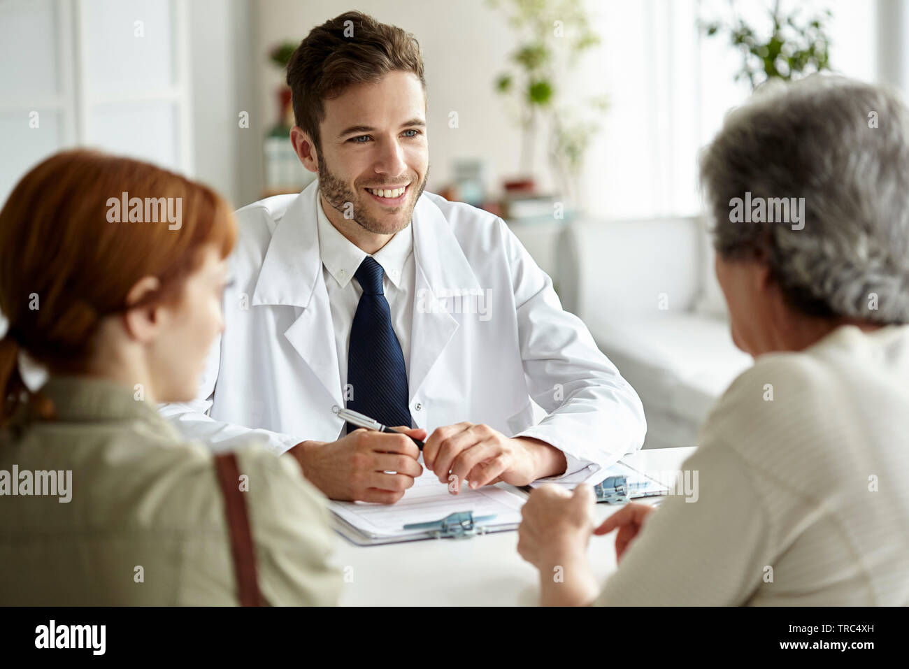 Smiling female doctor seniors hi-res stock photography and images - Alamy