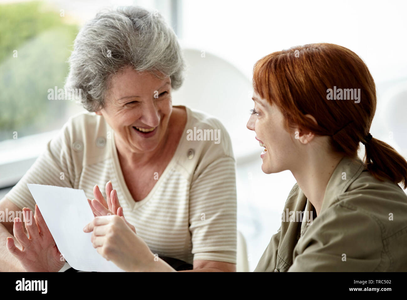Mother and daughter holding prescription Stock Photo