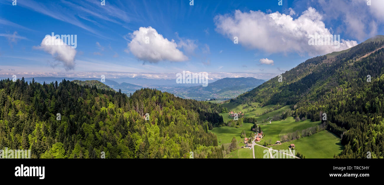 panoramas from Le Mole in the French Pre Alps looking down toward the Arve river valley and Geneva, Switzerland in the distan Stock Photo