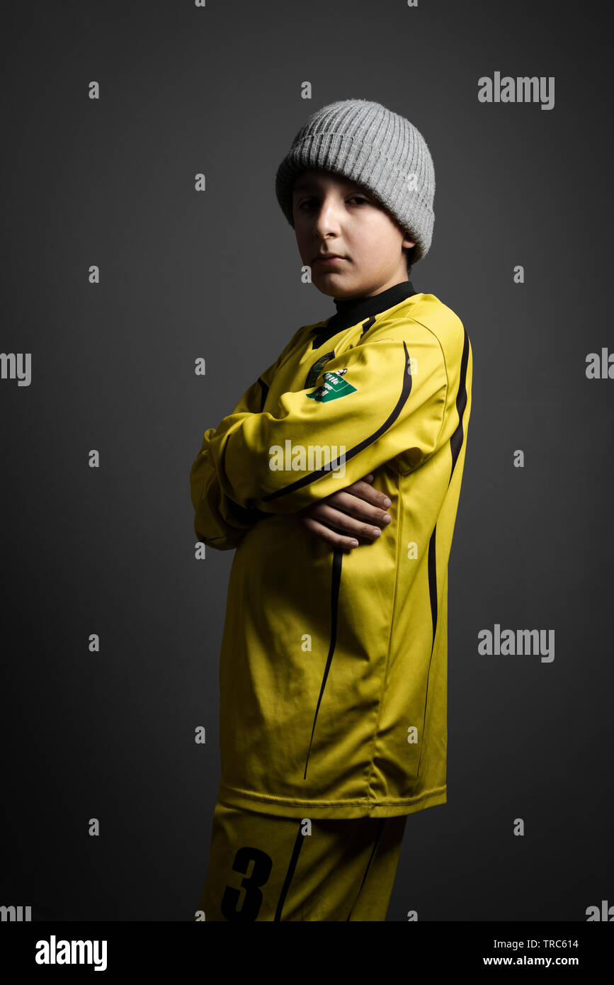 Boy in football outfit. Stock Photo