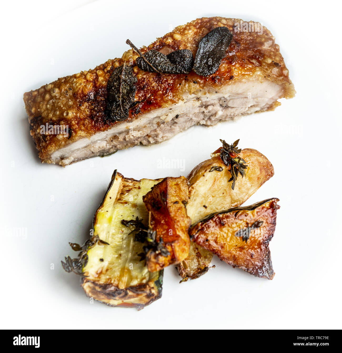 Delicious Pork Belly and crackle with sage and roasted zucchini