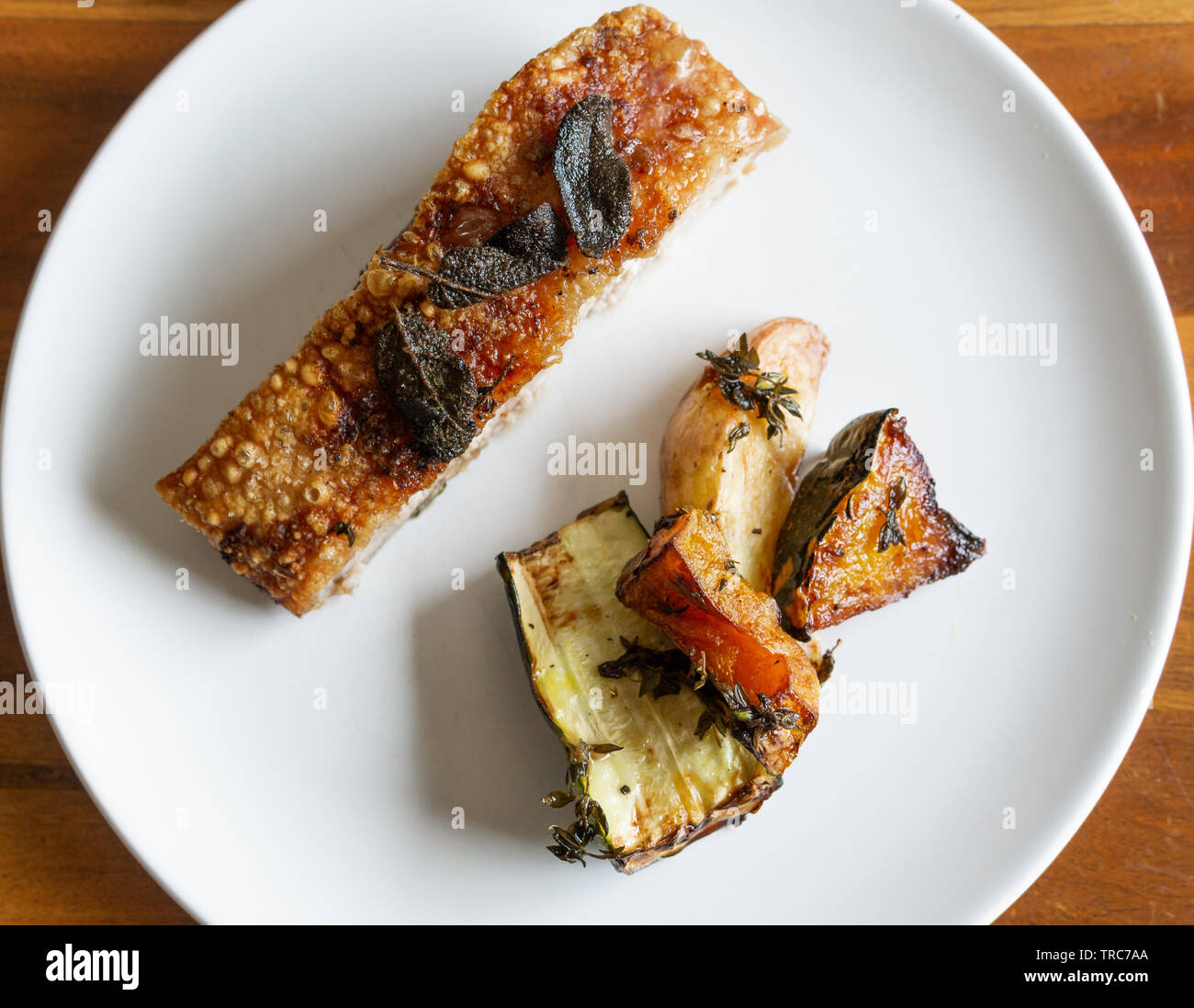 Delicious Pork Belly and crackle with sage and roasted zucchini