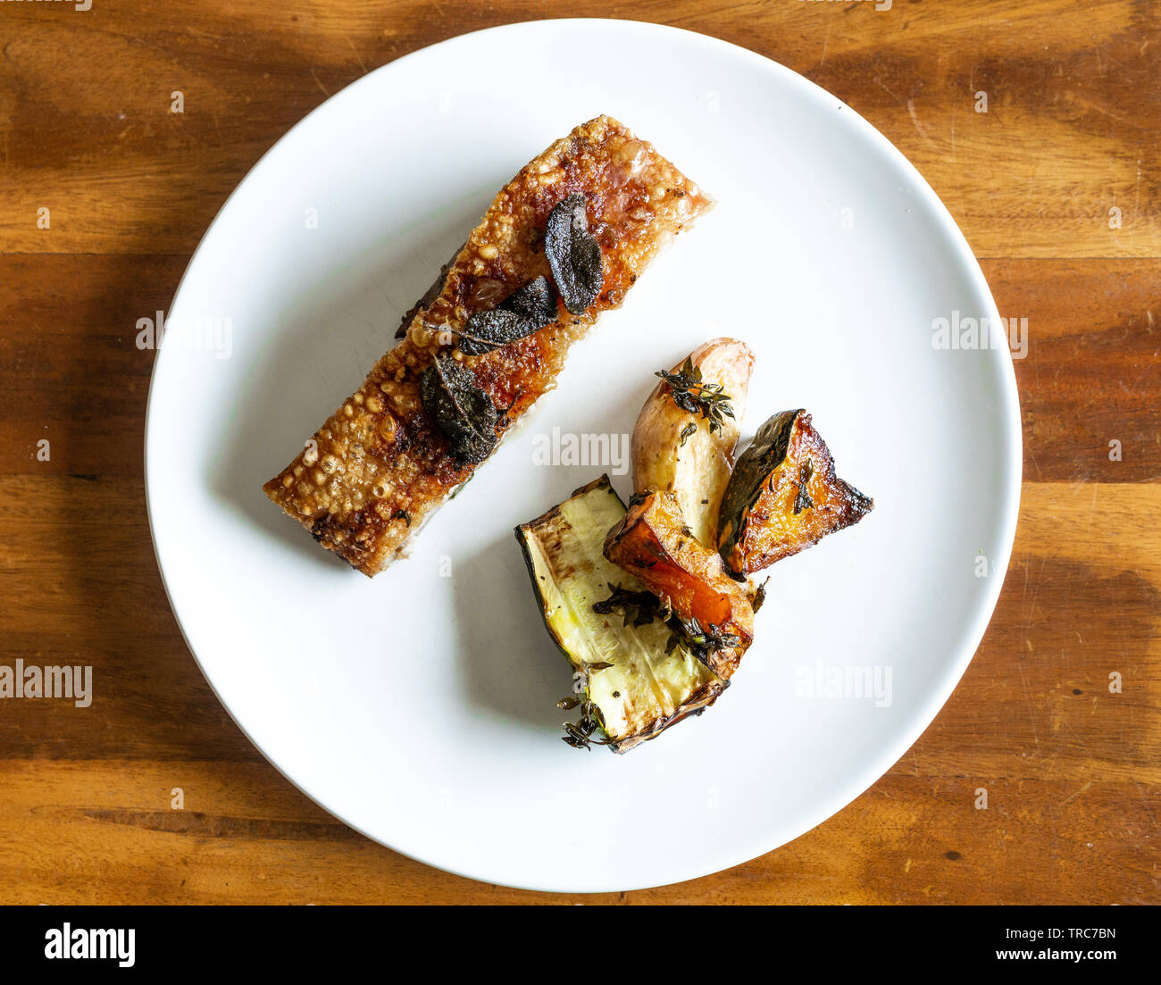 Delicious Pork Belly and crackle with sage and roasted zucchini