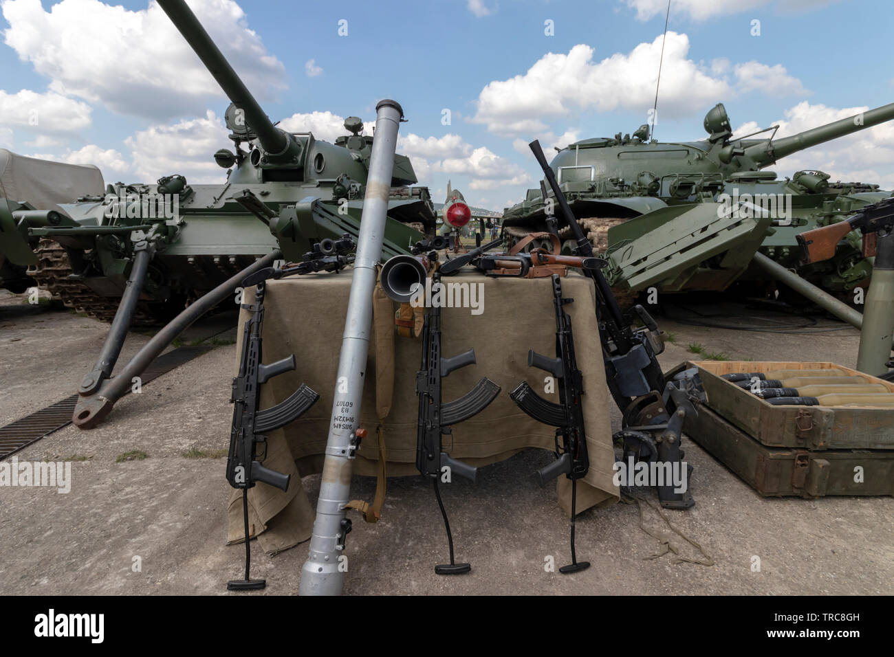 BUDAPEST/HUNGARY - 05.18, 2019: Russian military gear on display: automatic weapons, machine guns, grenade launchers, rpg, tank shells in ammo crates. Stock Photo