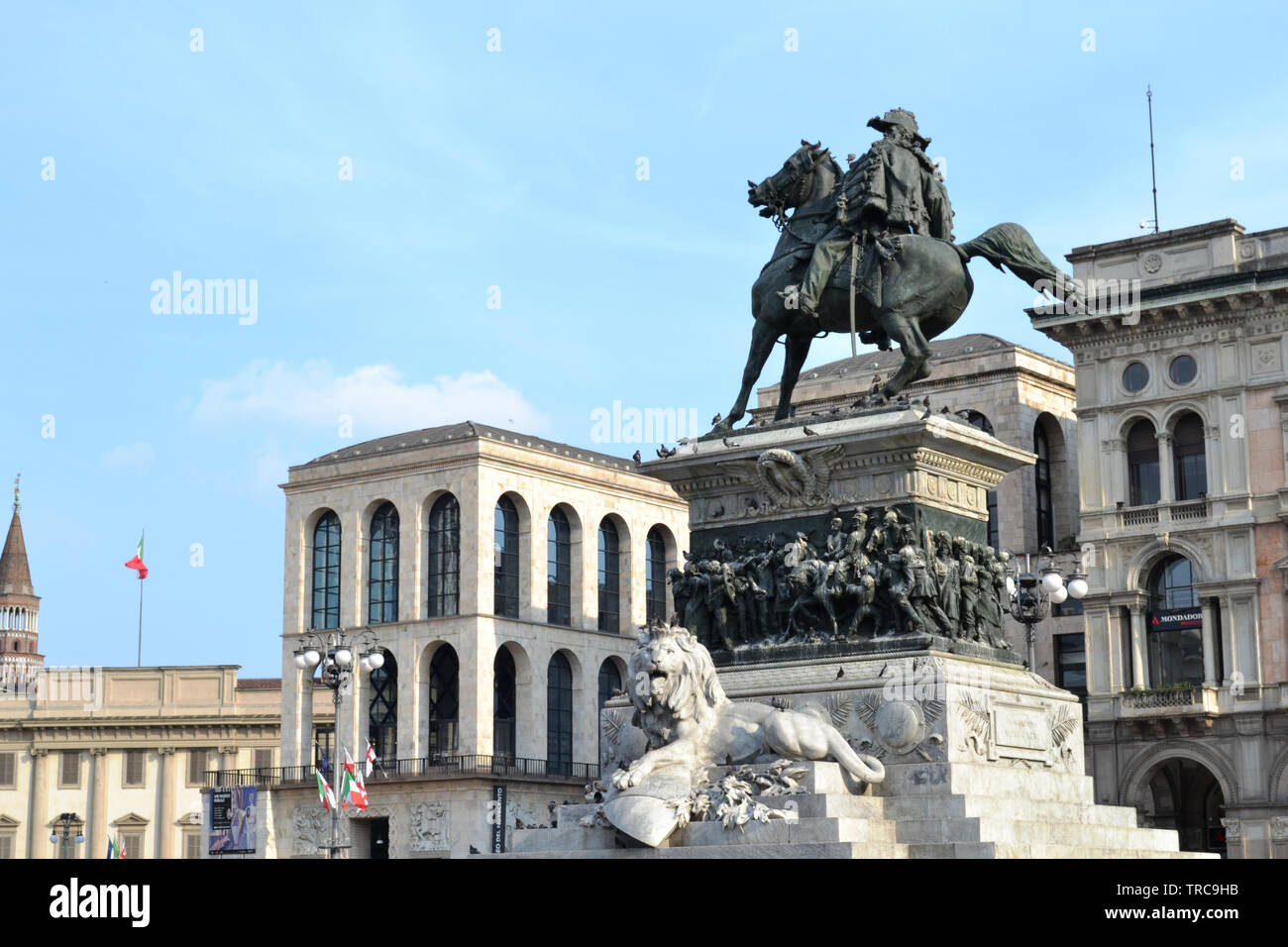 Milan/Italy - June 1, 2015: View to monument to king Vittorio Emanuele II, Royal Palace and XIX century museum at Duomo square in sunny summer day. Stock Photo