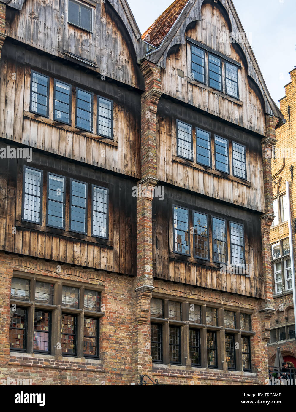 Exterior of medieval house on The Rozenhoedkaai (Quay of the Rosary). It is the hotel where 'In Bruges' was shot. Cityscape of Bruges streets Stock Photo
