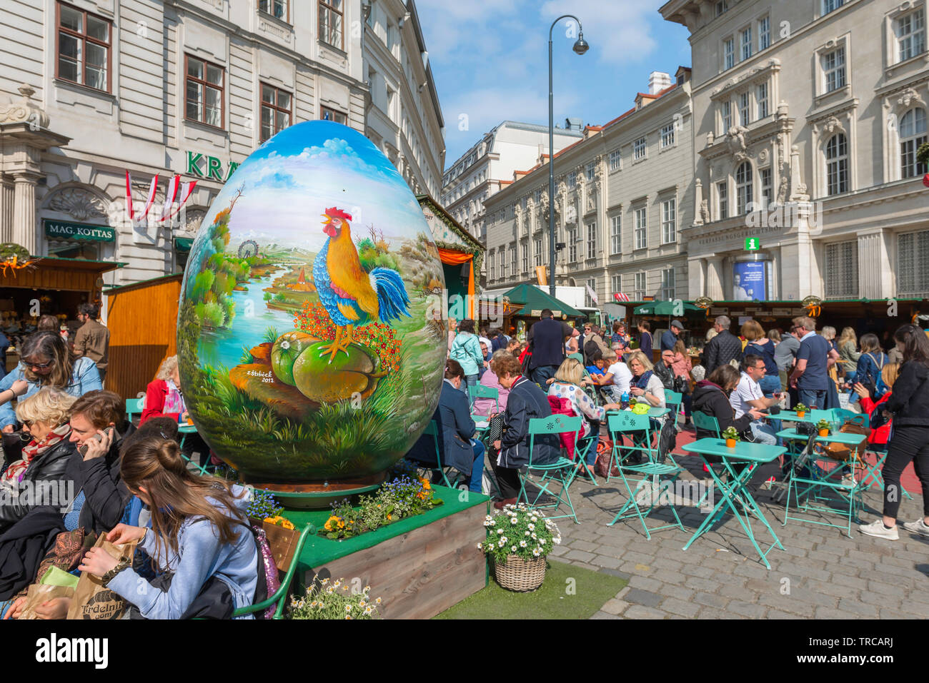 Vienna Easter Market, view of people sitting at cafe tables in the Easter Market in Am Hof in the centre of the city of Vienna, Wien, Austria. Stock Photo