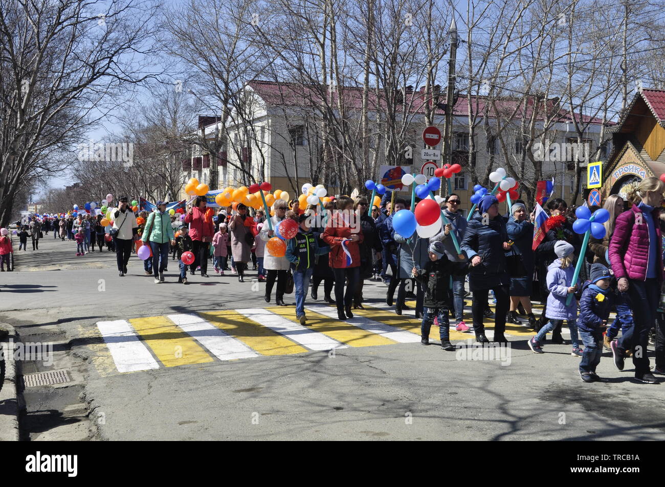 May Day procession at the port of Korsakov on Aniva Bay, in the south of Sakhalin Island, far eastern Russia, Остров  Сахалин Stock Photo