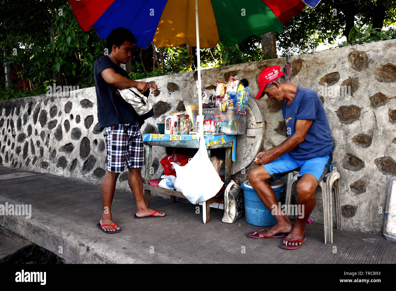 Antipolo City Philippines May 31 19 A Street Vendor Sells Assorted Candies And Cigarettes In His Makeshift Store At A Sidewalk Stock Photo Alamy Antipolo City Philippines May 31 19 A Street Vendor Sells Assorted Candies And Cigarettes In His Makeshift Store At A Sidewalk Stock Photo Alamy