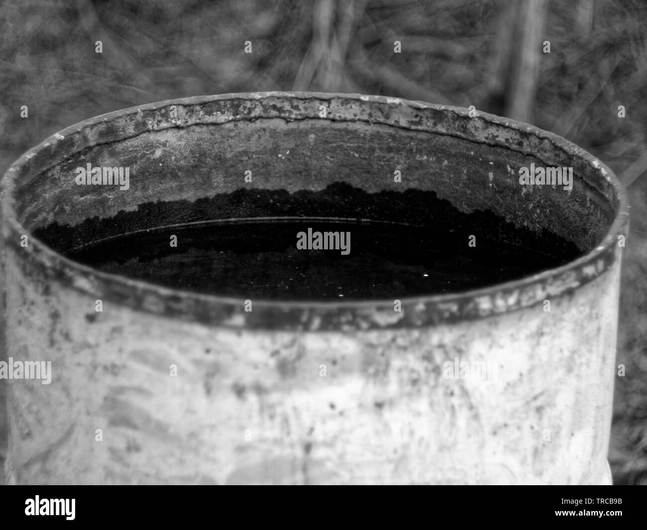 old metal water barrel in the garden, Russia Stock Photo Alamy