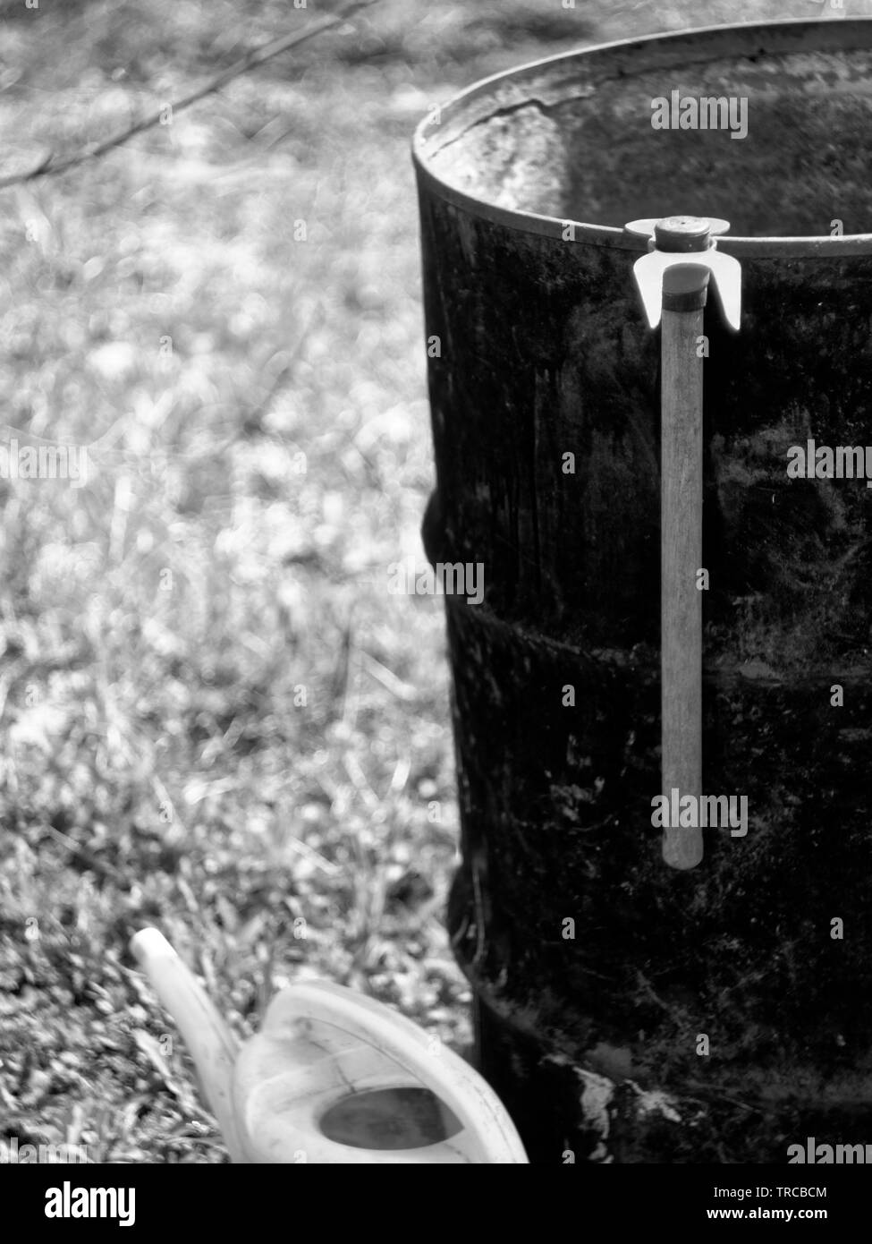 old metal water barrel in the garden, Russia Stock Photo Alamy