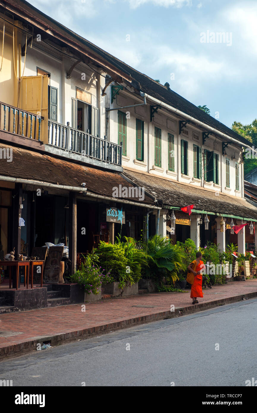 A street scene with French colonial -built shop houses in central Luang Prabang, a town World Heritage listed for its unique architecture. Lao PDR. Stock Photo