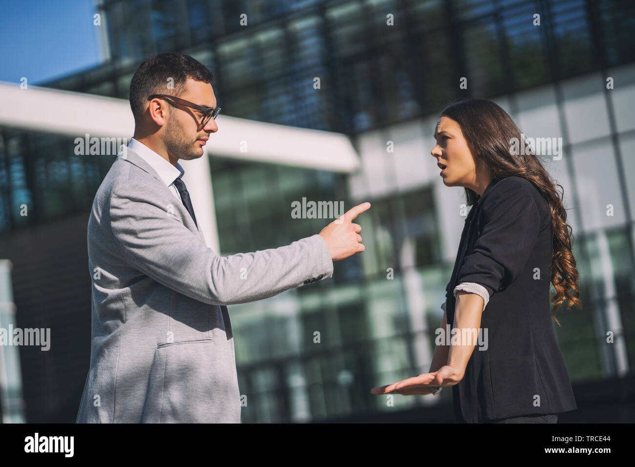 Businesswoman is being fired by her boss Stock Photo - Alamy