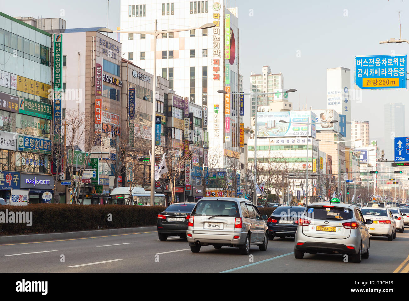 Busan, South Korea - March 12, 2018: Cityscape of Busan, street view with cars and people Stock Photo