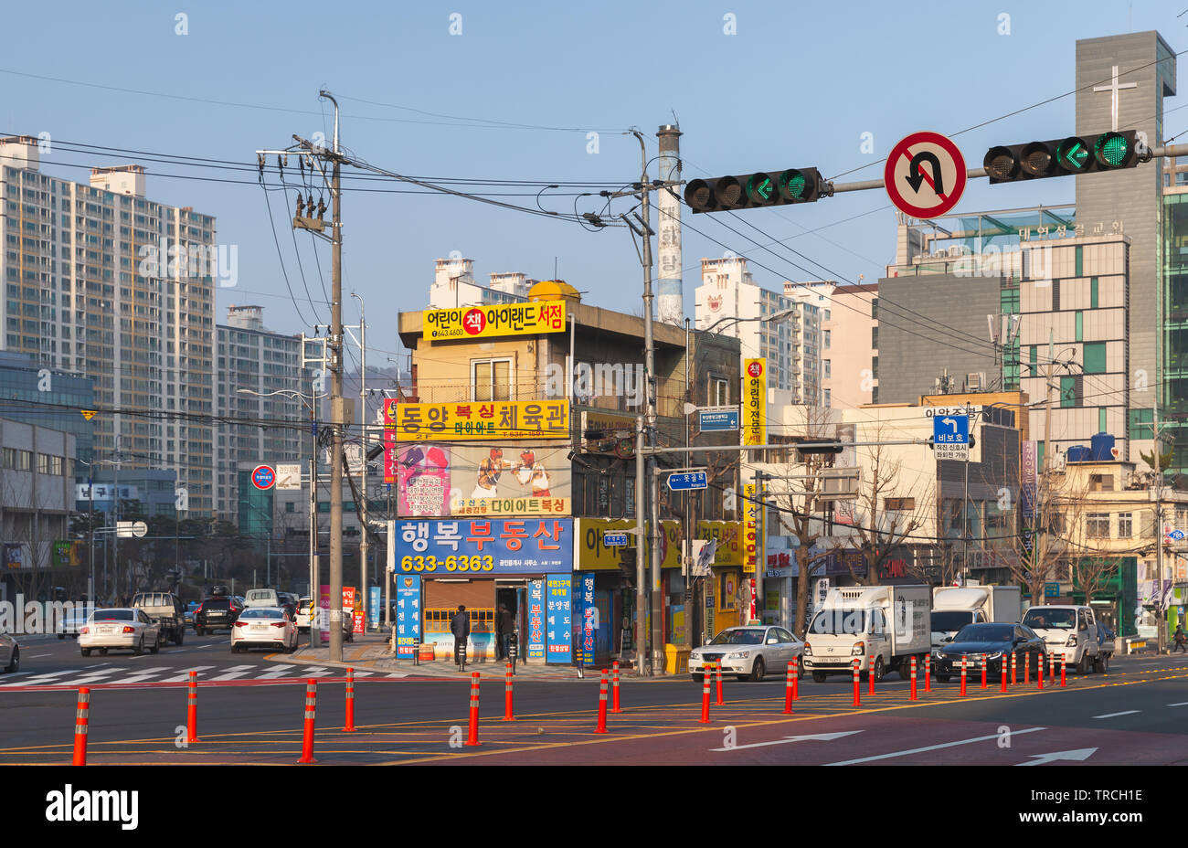 Busan, South Korea - March 12, 2018: Cityscape of Busan, street view with cars and walking ordinary people Stock Photo