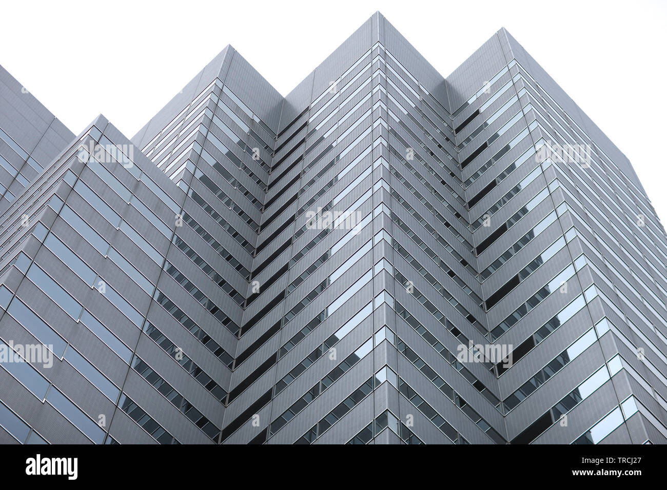 Angled protrusions of tall buildings financial and business center of the modern city Stock Photo