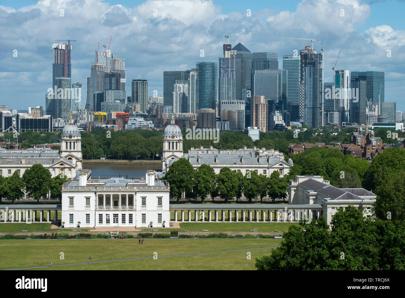 London England UK. Canary Wharf and Queen's House Greenwich photographed from Greenwich Park in South East London. May 2019 Stock Photo