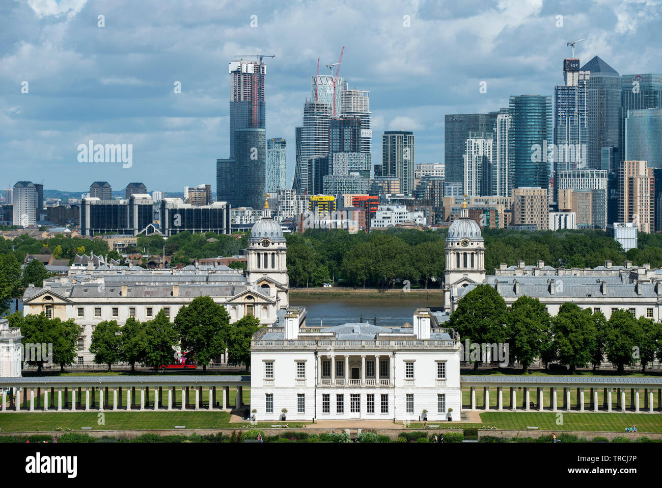 London England UK. Canary Wharf and Queen's House Greenwich photographed from Greenwich Park in South East London. May 2019 Stock Photo