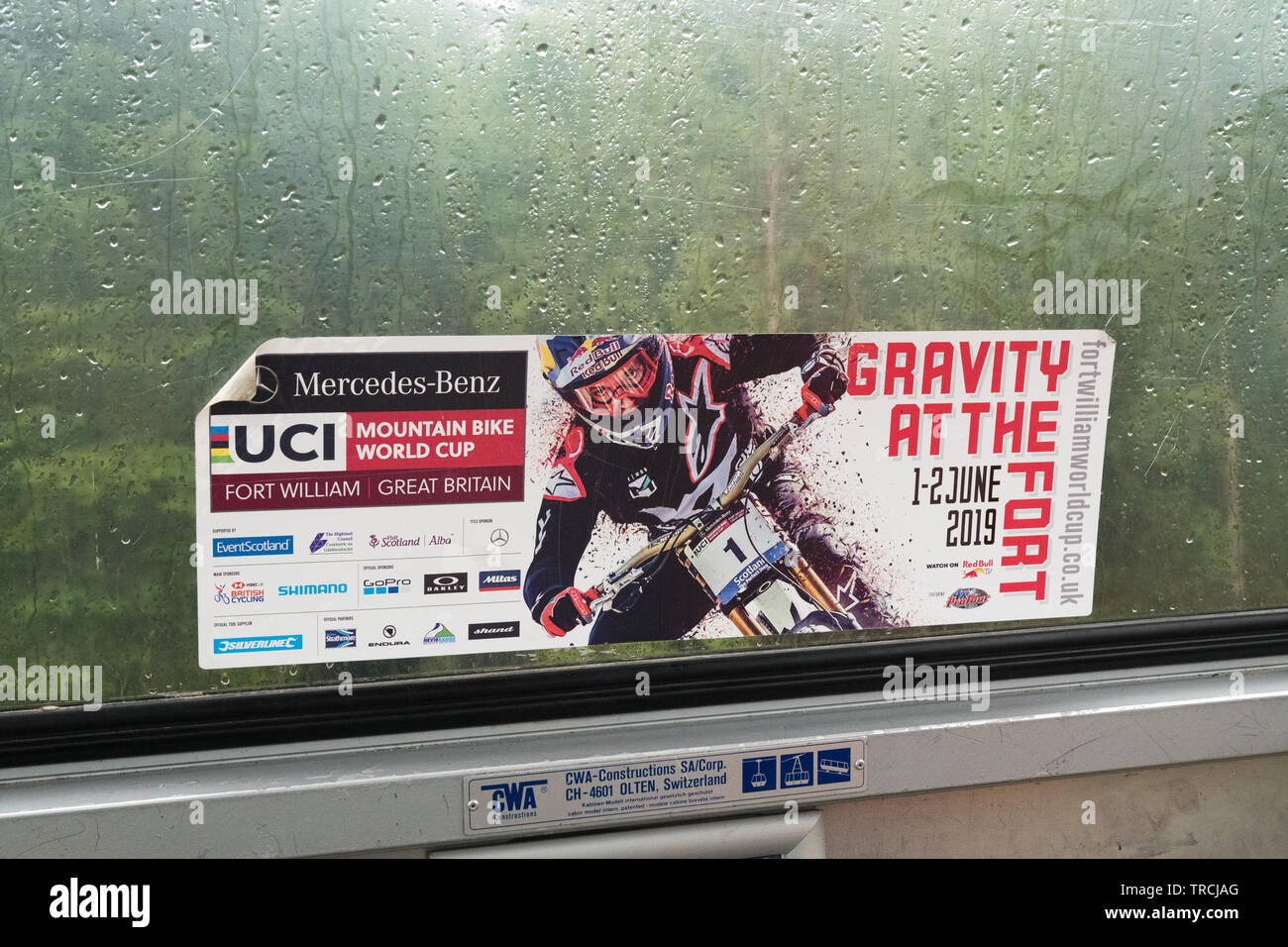 UCI Mountain Bike World Cup 2019 advertising sticker in gondola during a very wet weekend of racing - Fort William, Scotland, UK Stock Photo