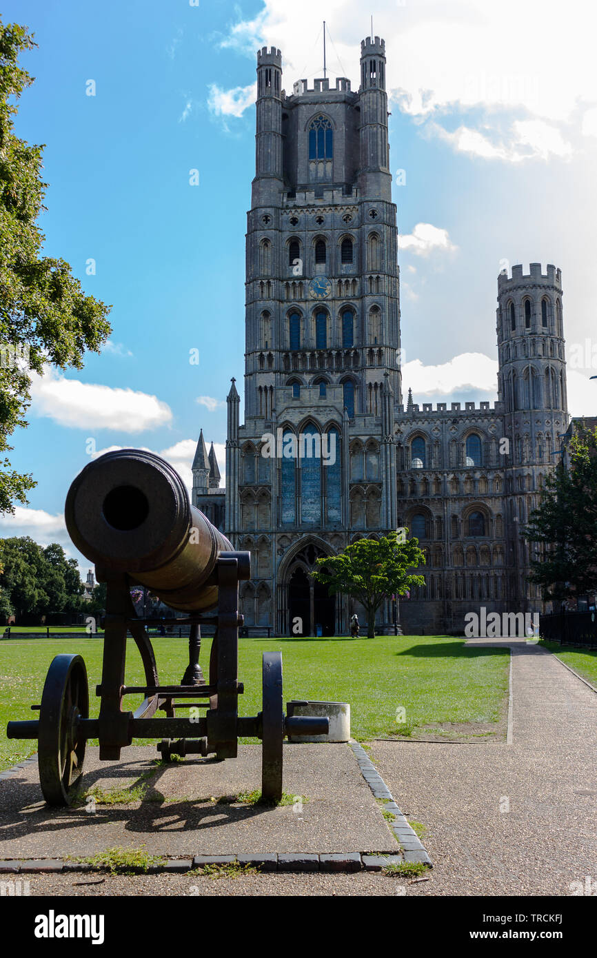 Seen in front of the West Tower of Ely Cathedral, the Russian Cannon captured during the Crimean War which was presented to the people of Ely by Queen Stock Photo