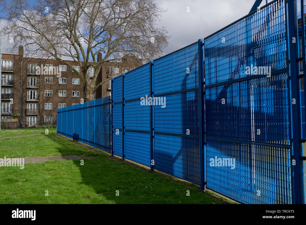 Security fence at a playground in a council housing estate in east