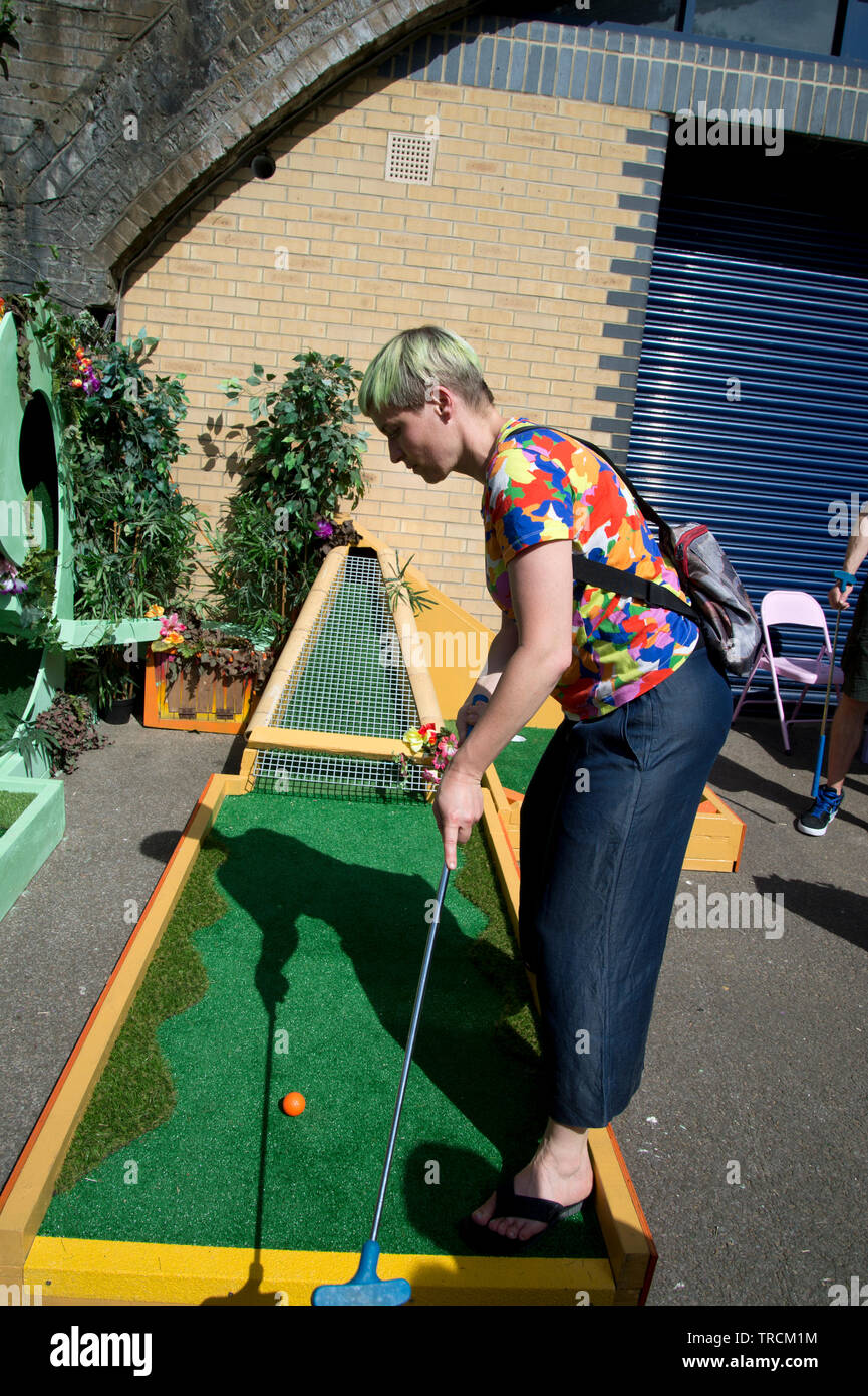 London, Hackney. London Fields. Crazy mini golf at the back of a railway arch. Stock Photo
