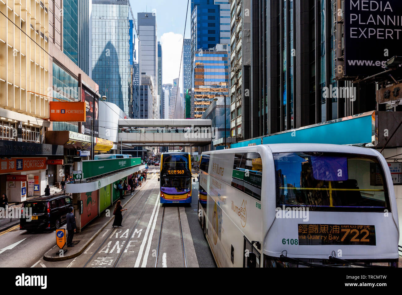 Hong Kong Buses and City Skyline, Hong Kong, China Stock Photo