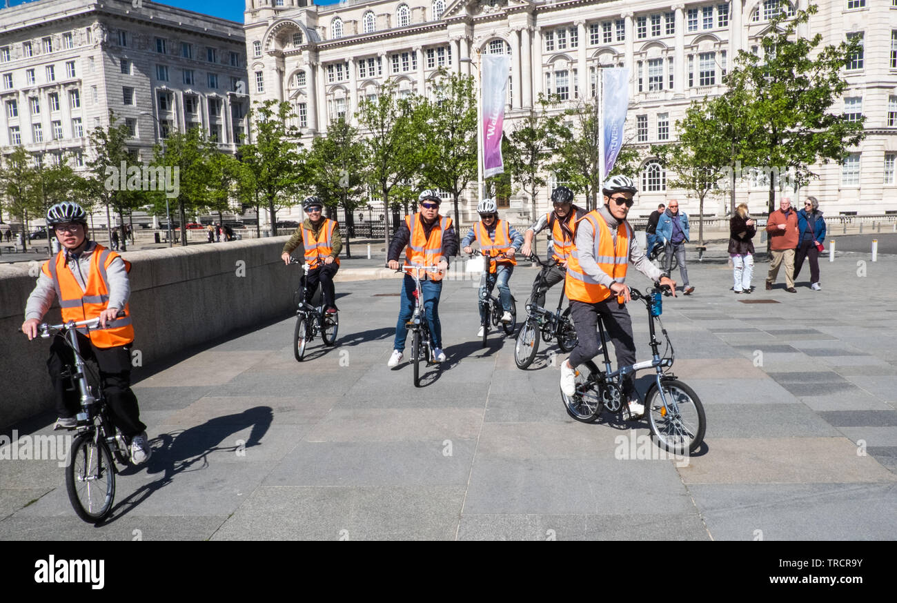 Bicycle,bicyles,tour,tourists,waterfront,River Mersey,Liverpool,Merseyside,England,GB,UK,Great Britain,British Stock Photo
