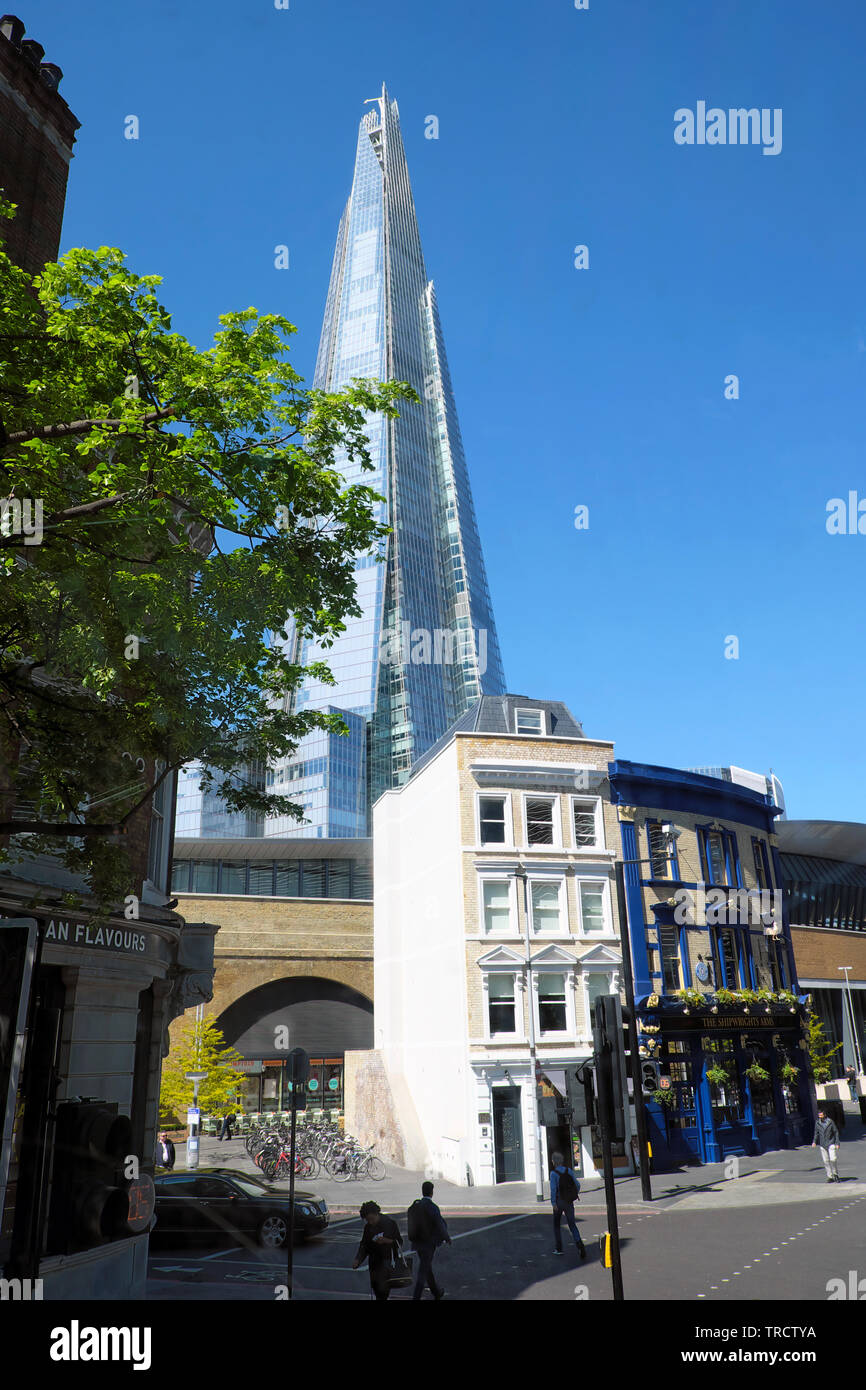 The Shard skyscraper building from Tooley Street pub Shipwright Arms in vertical cityscape view of South London England UK Europe EU  KATHY DEWITT Stock Photo
