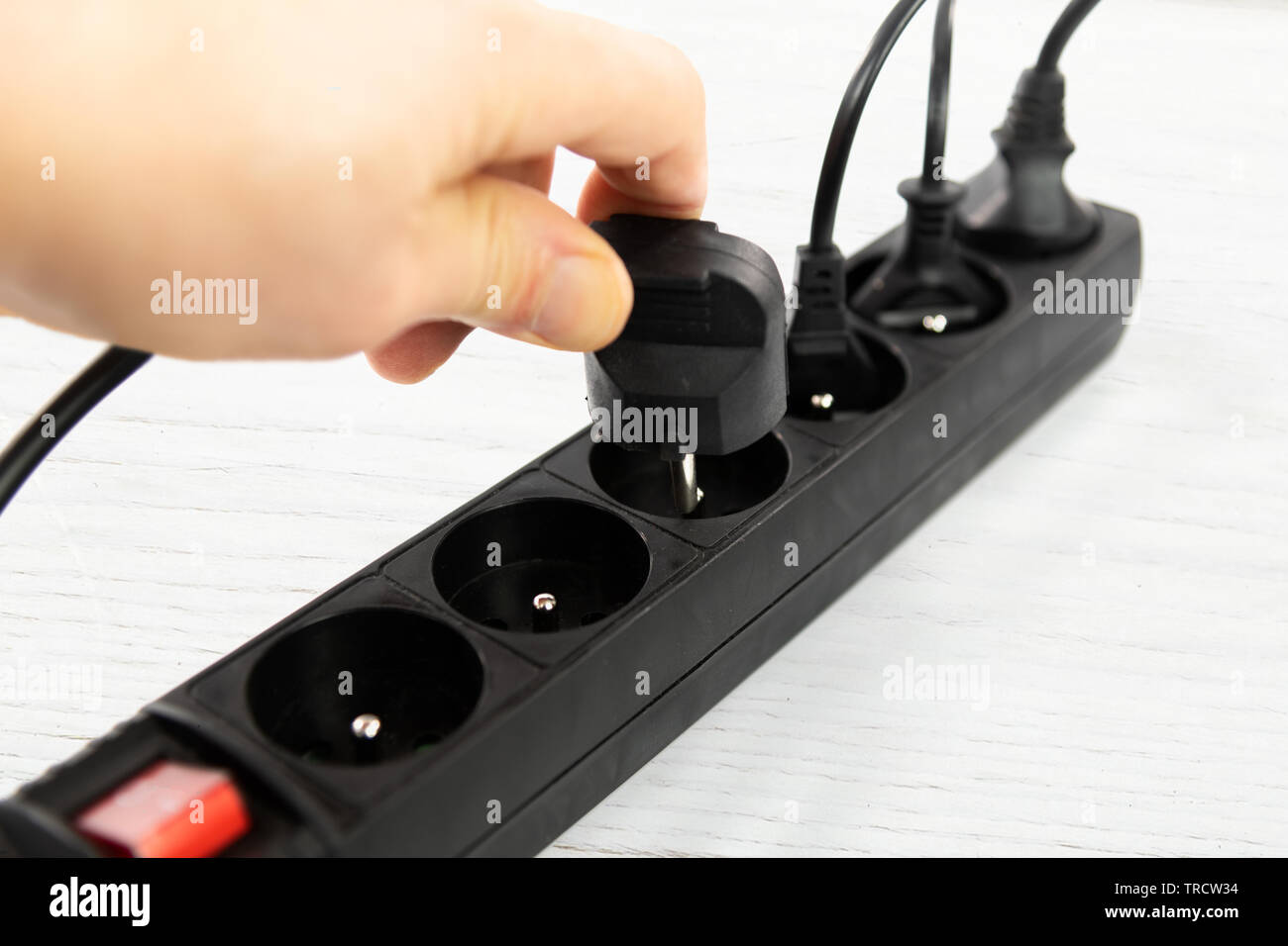 Extension cord pulling out electric hi-res stock photography and images -  Alamy