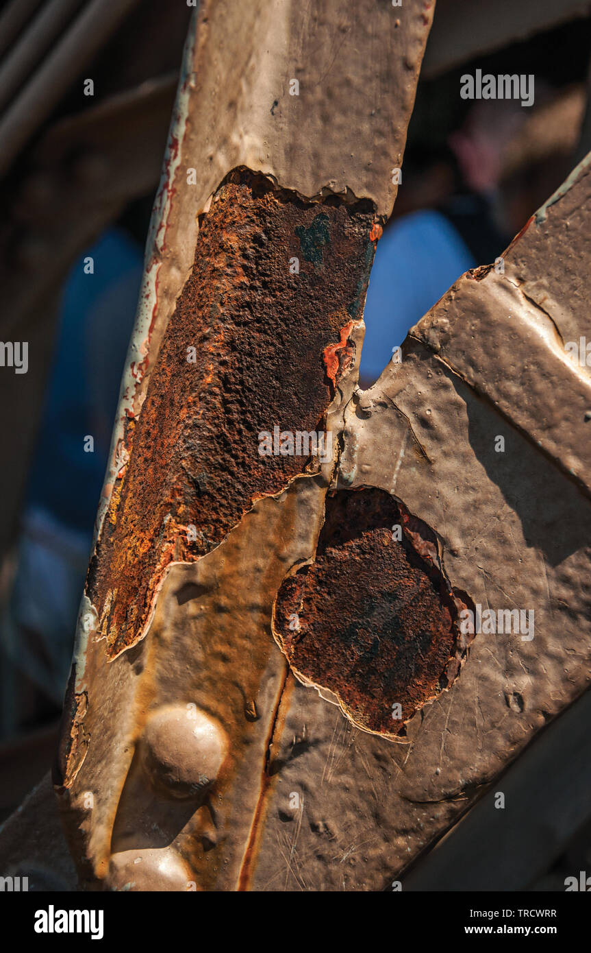 Closeup of rusty bars on the iron structure of the Eiffel Tower in