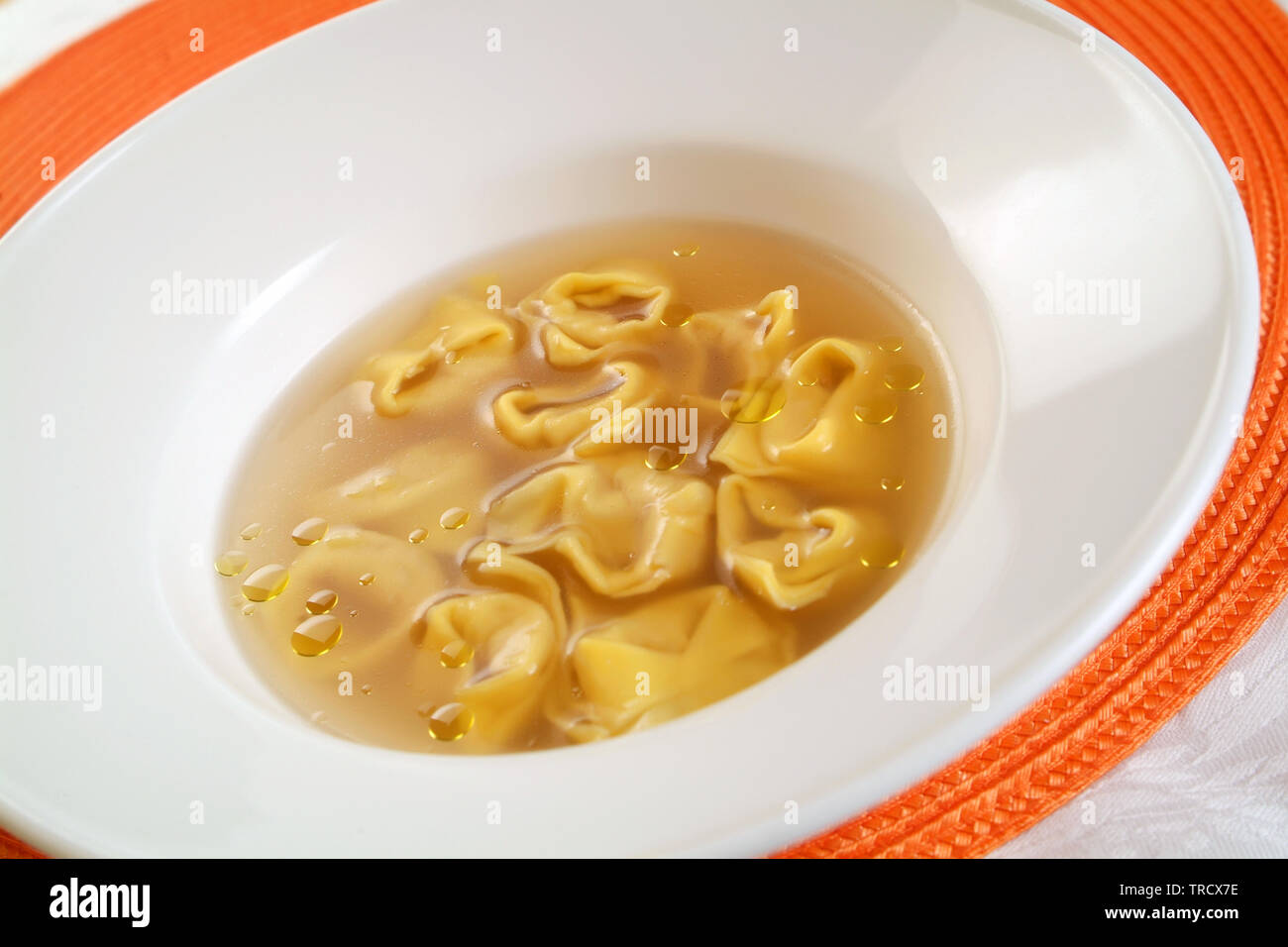 Italian food recipe, Tortelli in brodo. Stock Photo