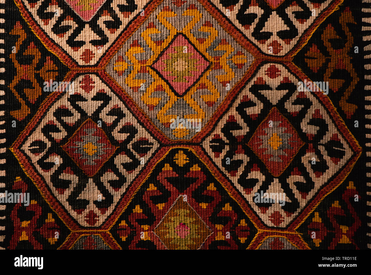 Handmade woven rug and tapestry - vintage carpets on a Turkish bazaar. Traditional Turkey rugs 